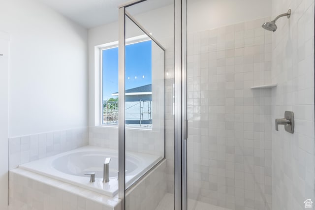 3573 W 725 S Unit 106, West Weber, UT 84401 - full bathroom with a shower stall and a garden tub