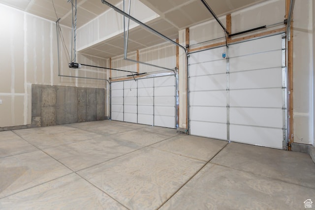 3573 W 725 S Unit 106, West Weber, UT 84401 - garage featuring a garage door opener