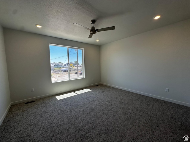 carpeted empty room featuring ceiling fan, recessed lighting, and baseboards