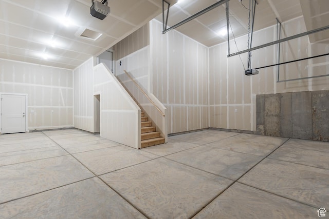3573 W 725 S Unit 106, West Weber, UT 84401 - garage featuring a garage door opener