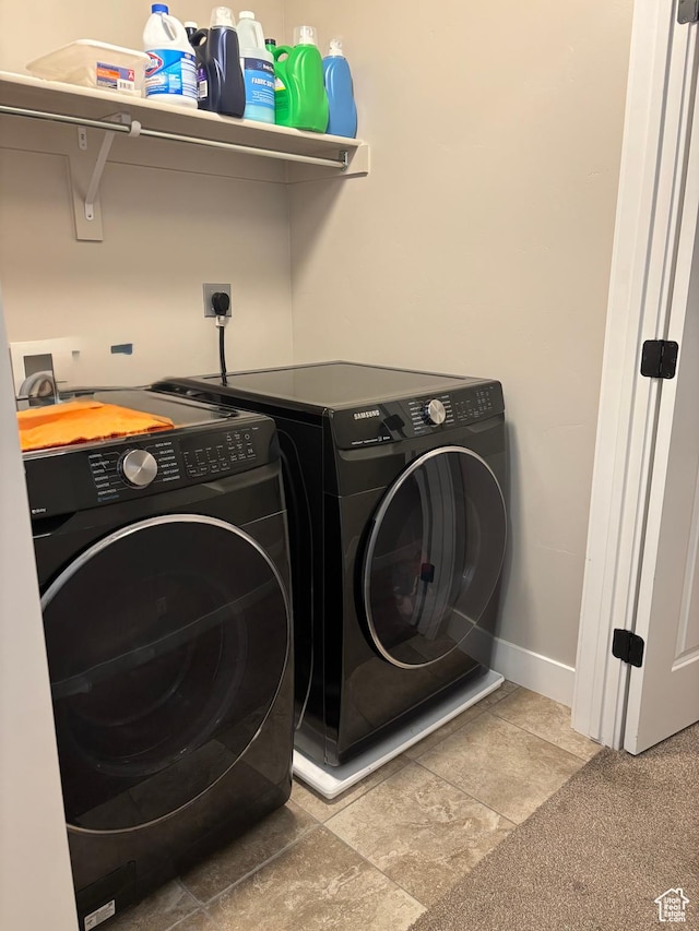 4317 W Quiet Shade Dr, Herriman, UT 84096 - clothes washing area with washer and dryer and baseboards