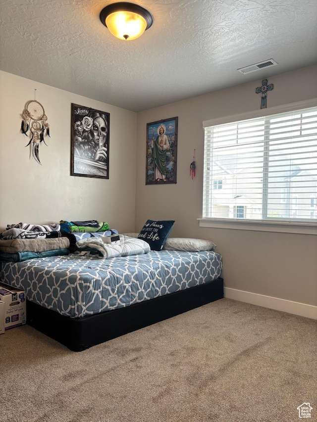 4317 W Quiet Shade Dr, Herriman, UT 84096 - carpeted bedroom with a textured ceiling and baseboards