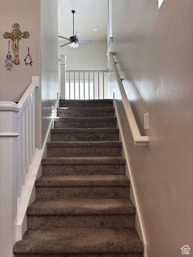 4317 W Quiet Shade Dr, Herriman, UT 84096 - stairway with a ceiling fan