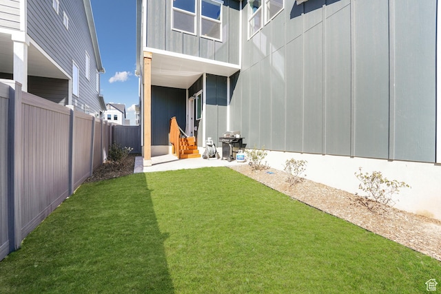 view of yard featuring entry steps
