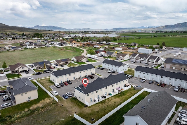 2460 W 450 N Unit 7, Tremonton, UT 84337 - aerial perspective of suburban area with a mountainous background