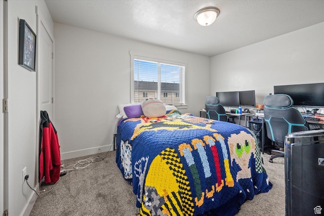 2460 W 450 N Unit 7, Tremonton, UT 84337 - bedroom featuring carpet floors and baseboards