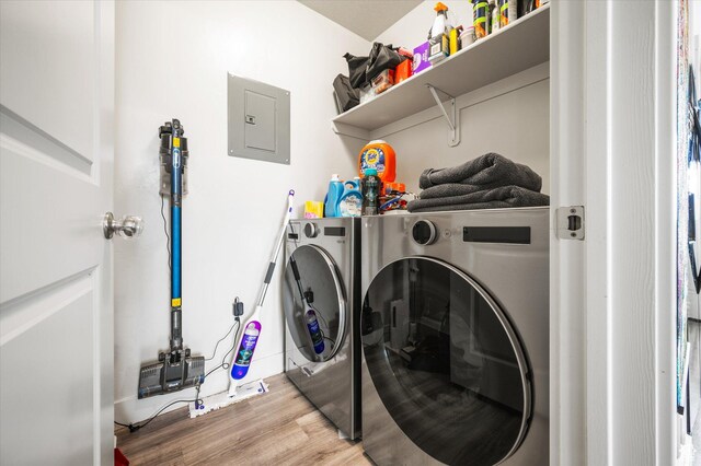2460 W 450 N Unit 7, Tremonton, UT 84337 - laundry area with washer and dryer, wood finished floors, and electric panel