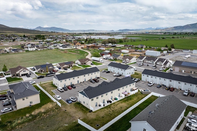 2460 W 450 N Unit 7, Tremonton, UT 84337 - aerial view of residential area with a mountainous background