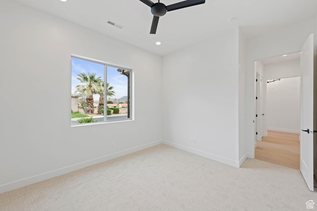 unfurnished bedroom with carpet, baseboards, recessed lighting, and a ceiling fan