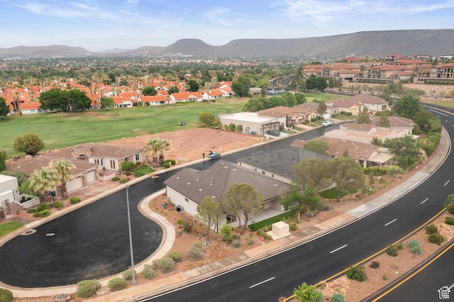 aerial view of residential area with a mountainous background