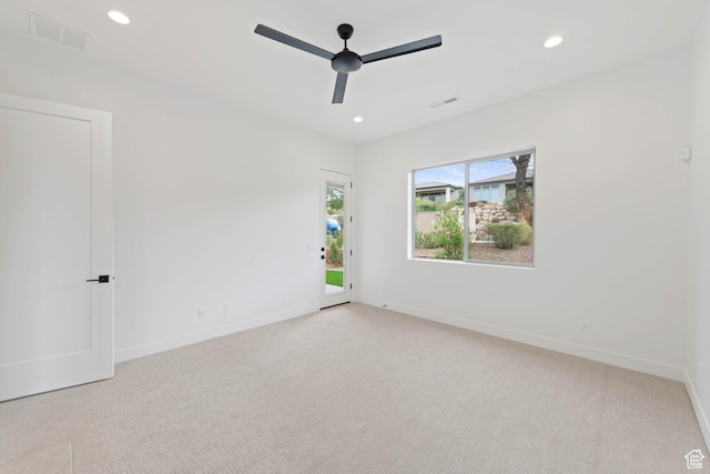 carpeted empty room with a ceiling fan, recessed lighting, and baseboards