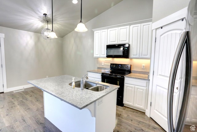 198 E 1430 S, Nephi, UT 84648 - kitchen with black appliances, lofted ceiling, a sink, white cabinetry, and light wood-type flooring