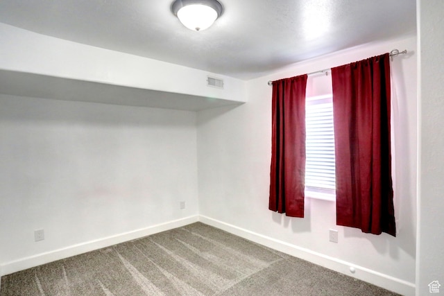 198 E 1430 S, Nephi, UT 84648 - unfurnished room with dark colored carpet and baseboards