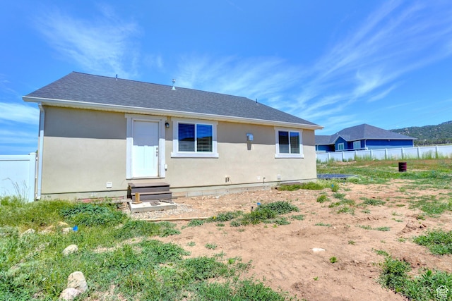 198 E 1430 S, Nephi, UT 84648 - back of house featuring entry steps, fence, and stucco siding
