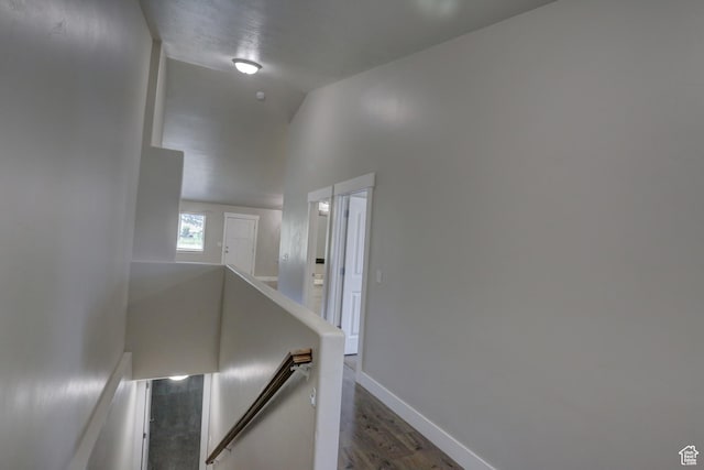 198 E 1430 S, Nephi, UT 84648 - hall with an upstairs landing, dark wood finished floors, vaulted ceiling, and baseboards