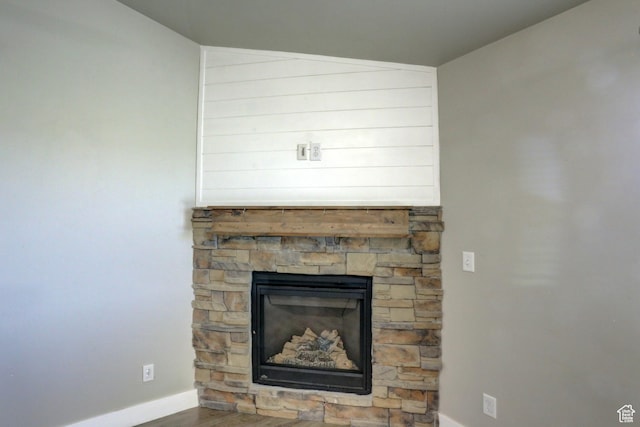 198 E 1430 S, Nephi, UT 84648 - detailed view of baseboards, wood finished floors, and a stone fireplace
