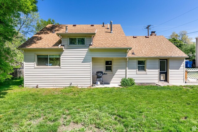 804 E 100 N, Logan, UT 84321 - back of property featuring a shingled roof and a chimney