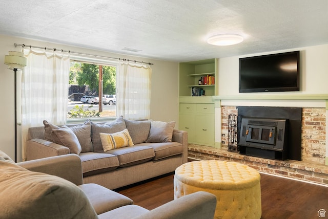 804 E 100 N, Logan, UT 84321 - living area featuring wood finished floors, a textured ceiling, and built in features