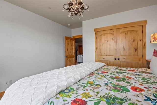 14295 N Council Fire Trl, Kamas, UT 84036 - bedroom with a closet and a chandelier