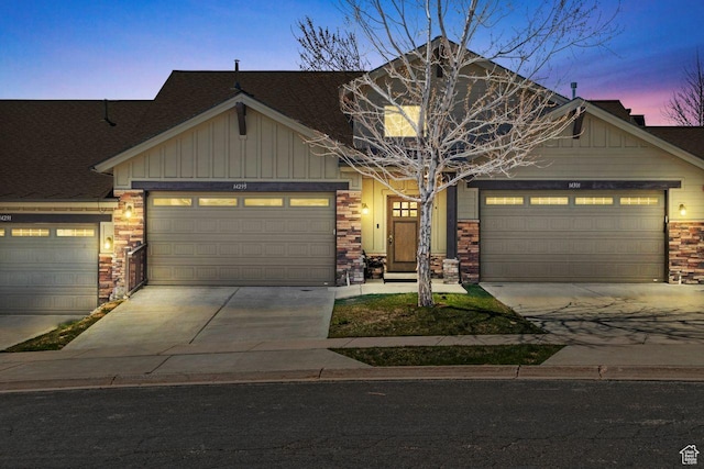 14295 N Council Fire Trl, Kamas, UT 84036 - craftsman inspired home with board and batten siding, concrete driveway, stone siding, and an attached garage