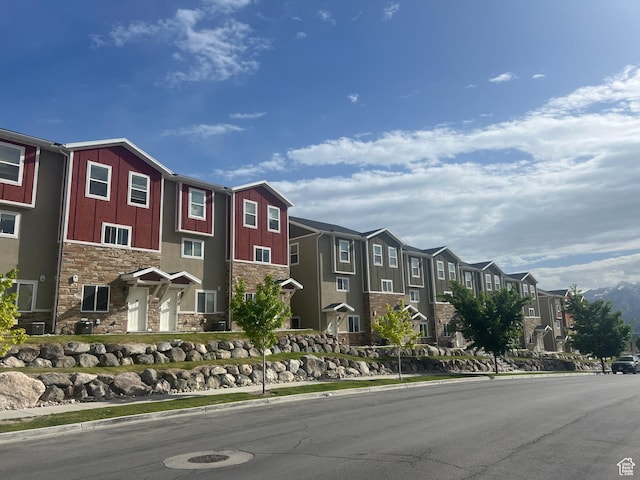 4129 W Miner Vw, Herriman, UT 84096 - view of front of home with stone siding and a residential view