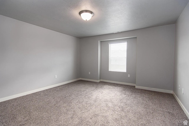 4129 W Miner Vw, Herriman, UT 84096 - unfurnished room featuring carpet floors, baseboards, and a textured ceiling