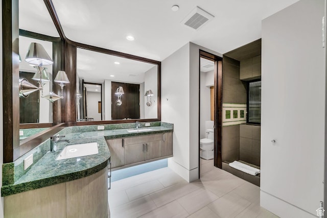 1203 Canyon Springs Rd, Springdale, UT 84767 - full bathroom with toilet, vanity, baseboards, tile patterned flooring, and recessed lighting