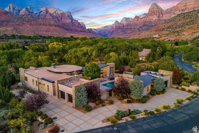 1203 Canyon Springs Rd, Springdale, UT 84767 - aerial view at dusk of a mountain view