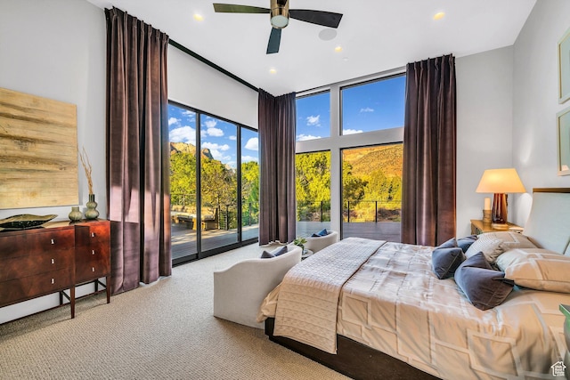 1203 Canyon Springs Rd, Springdale, UT 84767 - carpeted bedroom with access to outside, a wall of windows, recessed lighting, ceiling fan, and a towering ceiling