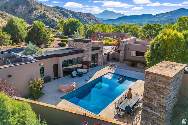 1203 Canyon Springs Rd, Springdale, UT 84767 - view of pool featuring a mountain view and a patio