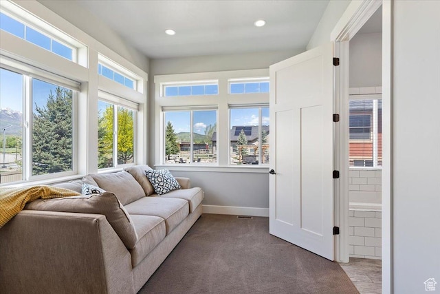 5707 Scenic Ln, Mountain Green, UT 84050 - sunroom featuring baseboards, carpet flooring, and recessed lighting