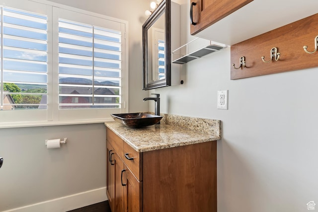 5707 Scenic Ln, Mountain Green, UT 84050 - bathroom featuring vanity and baseboards