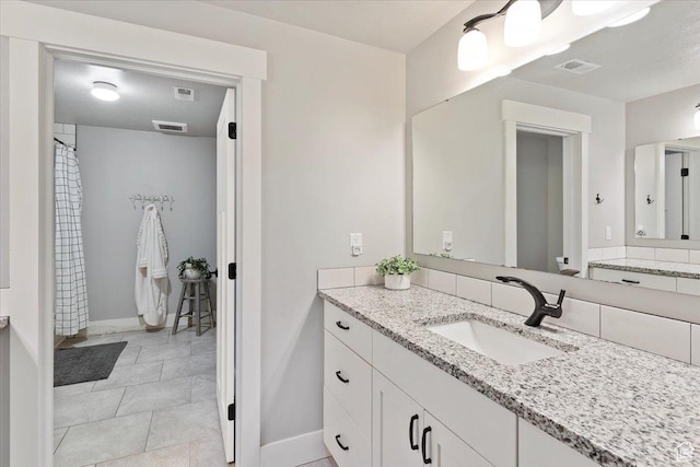 5707 Scenic Ln, Mountain Green, UT 84050 - bathroom featuring vanity and baseboards