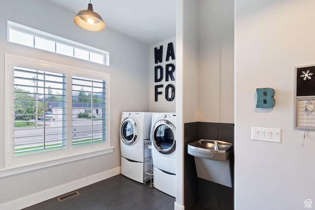 5707 Scenic Ln, Mountain Green, UT 84050 - washroom with independent washer and dryer and baseboards
