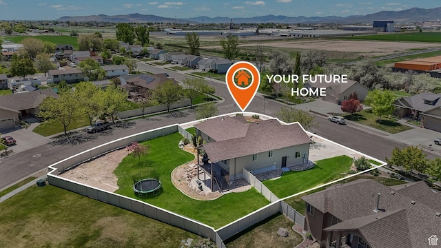 aerial view of residential area with mountains and property parcel outlined