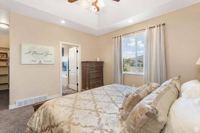 carpeted bedroom featuring a spacious closet, recessed lighting, baseboards, a ceiling fan, and ensuite bath