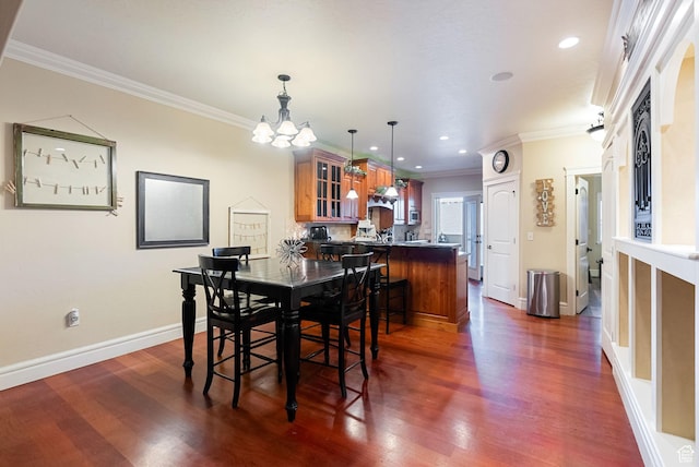 470 N Linden Ln, Providence, UT 84332 - dining room with a chandelier, ornamental molding, baseboards, dark wood finished floors, and recessed lighting