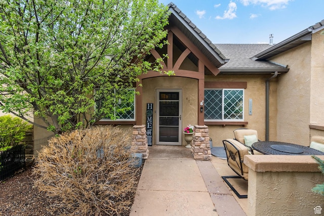 470 N Linden Ln, Providence, UT 84332 - property entrance with stucco siding and a shingled roof