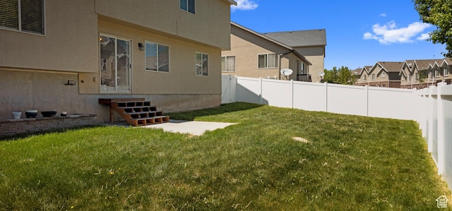 view of yard with a residential view