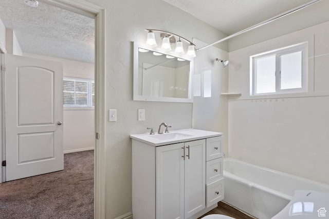 41 N 400 E, Brigham City, UT 84302 - bathroom with vanity, a textured ceiling, and shower / washtub combination