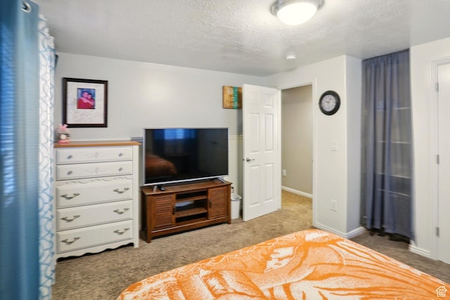 1424 W 3325 S, Perry, UT 84302 - carpeted bedroom featuring a textured ceiling and baseboards