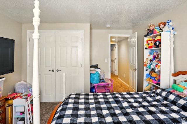 1424 W 3325 S, Perry, UT 84302 - bedroom with carpet, a textured ceiling, and a closet