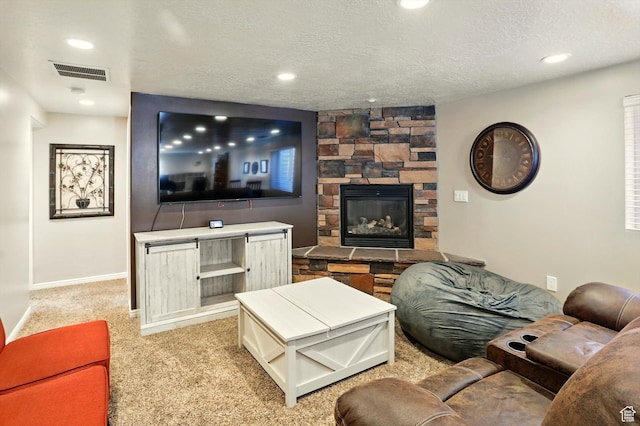 1424 W 3325 S, Perry, UT 84302 - living room with baseboards, a textured ceiling, light colored carpet, a fireplace, and recessed lighting