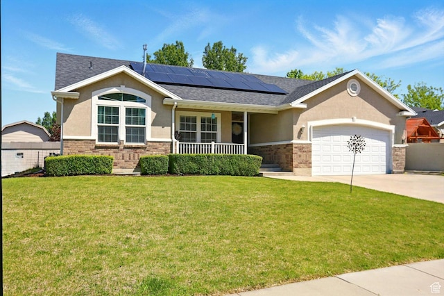 1424 W 3325 S, Perry, UT 84302 - ranch-style house with stucco siding, a porch, an attached garage, and a front yard