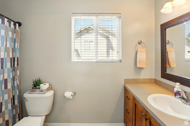 1424 W 3325 S, Perry, UT 84302 - bathroom featuring toilet, vanity, and a shower with shower curtain