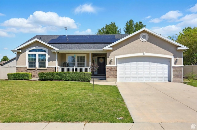 1424 W 3325 S, Perry, UT 84302 - ranch-style house featuring covered porch, a garage, a front yard, driveway, and stucco siding