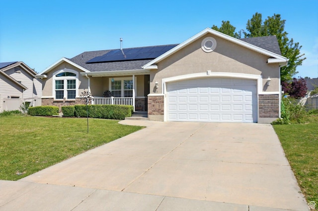 1424 W 3325 S, Perry, UT 84302 - single story home featuring covered porch, stucco siding, a front yard, a garage, and solar panels