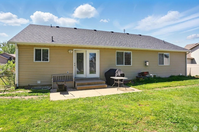 1424 W 3325 S, Perry, UT 84302 - back of property featuring a patio and roof with shingles