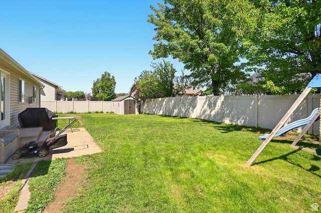 1424 W 3325 S, Perry, UT 84302 - view of yard with a storage shed, an outbuilding, and a patio