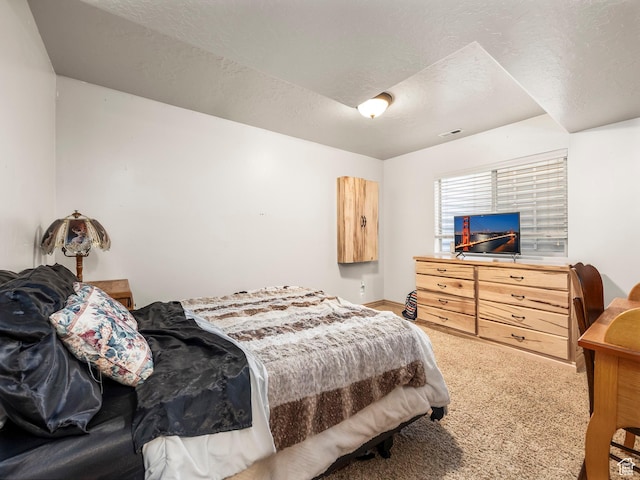 636 Quartz Dr, Santaquin, UT 84655 - bedroom featuring a textured ceiling and light colored carpet